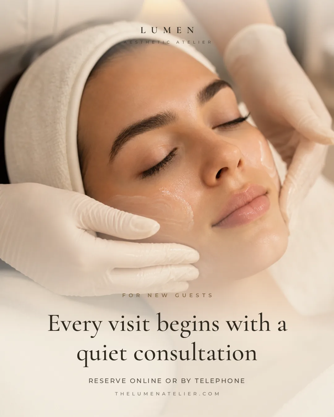 Sample photo post design for a fictional aesthetic atelier, a serif headline about consultations over a facial treatment photo